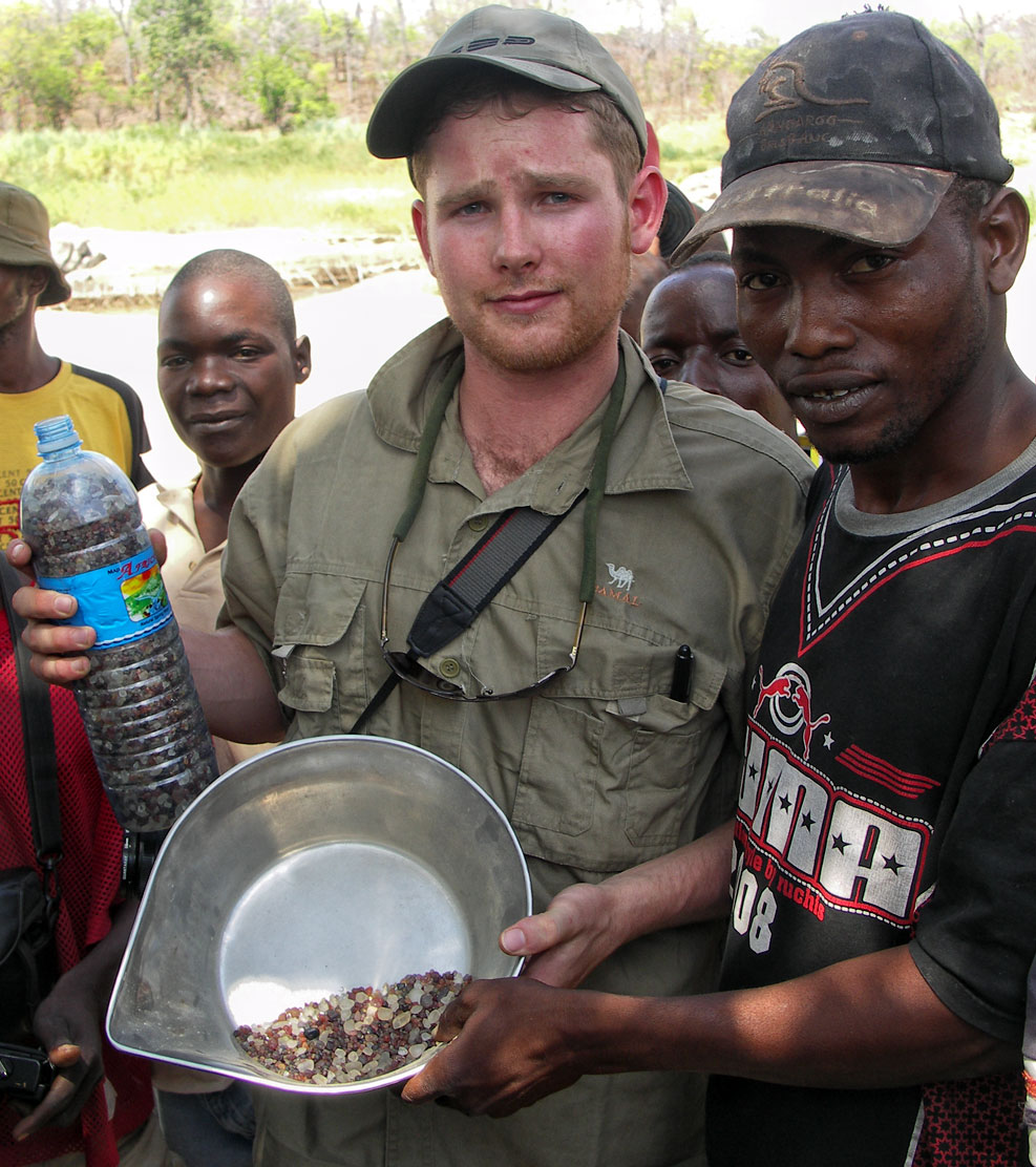 Warne Chitty along with a group of friendly natives along the Muhuwesi river in Tanzania's Tunduru district