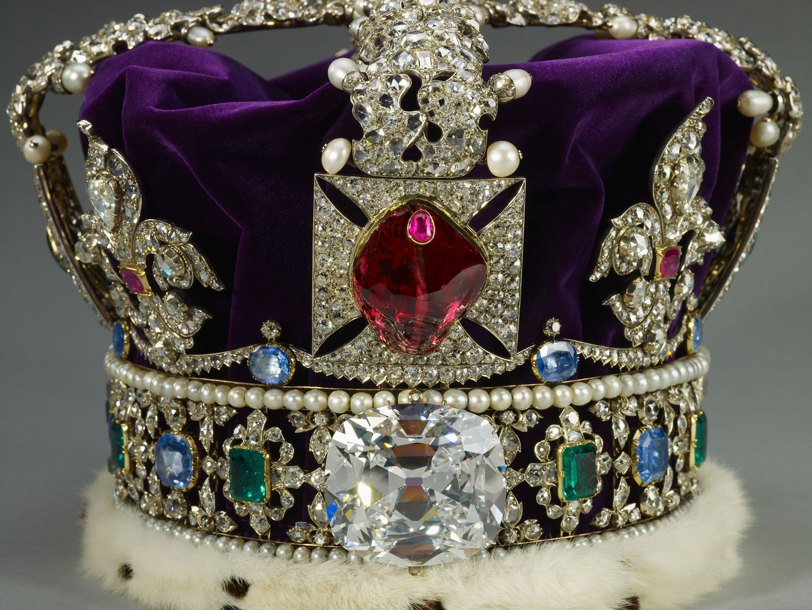 The Black Prince's ruby, a historic red spinel set in the Imperial State Crown and displayed in the Tower of London. A ruby, set in gold, is secured to the top of the spinel. (Photo: S. Greenaway, reproduced with the kind permission of H.M. The Queen. Crown Copyright reserved)