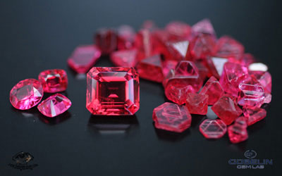 Fine Mogok red spinel (over 5 carats) with Mogok spinel crystals including "Star of David" macles.