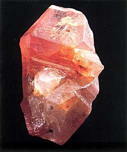 Sri Lankan padparadscha sapphire crystal, 8 by 5 cm; Collection: Paul Ruppenthal; Photo: Studio Hartmann; From Gem & Crystal Treasures by Peter Bancroft