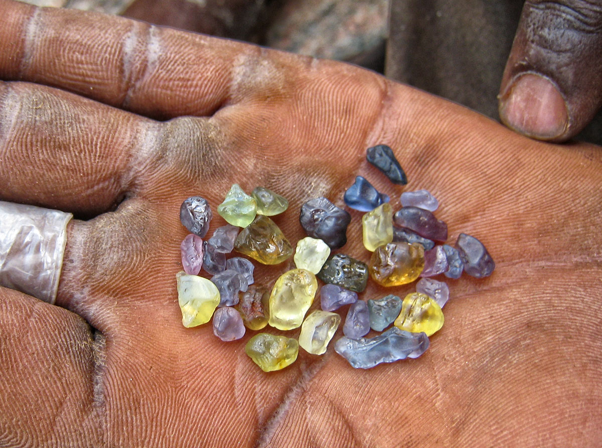 A handful of hope in Tanzania's Tunduru district. Tanzania sapphire, Lotus Gemology.
