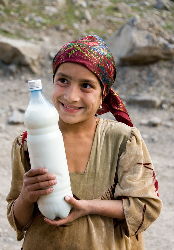 Got milk? A Tajik girl offers fermented milk to weary travelers in the remote Badakhshan region of Tajikistan