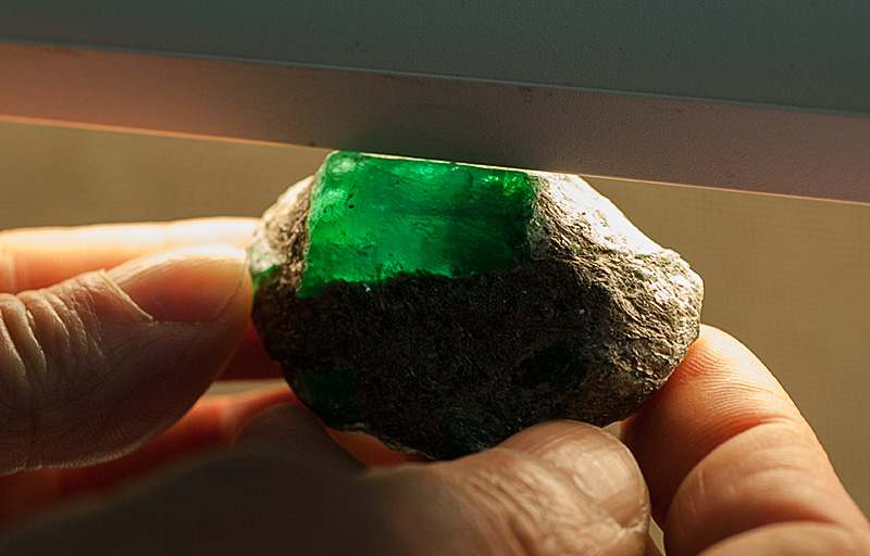 A large Russian emerald crystal still embedded in the mica schist. Photo: Richard W. Hughes