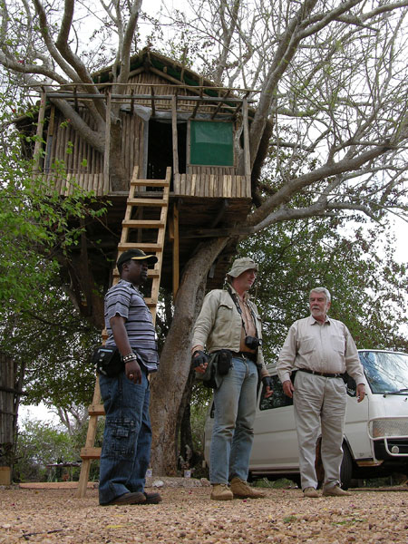 Kennedy Khamwathi, Vincent Pardieu and Campbell Bridges, near Bridges' tree-top house in the Tsavo area.